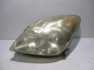 фара левая Toyota Corolla Verso 1 поколение 2002, 1.6 л., i, 3ZZ-FE, бензин, 5МКПП, красный, минивэн, передний привод, правый руль