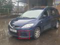 решётка бампера боковая левая Mazda 5 1 поколение [рестайлинг] CR 2008, 2.0 л., TD, RF7J, дизель, 6МКПП, stormy blue / 35j, минивэн, передний привод, правый руль, CE2250C21 - фото №3