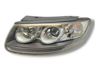 фара левая Hyundai Santa Fe 2 поколение (CM) [рестайлинг] CM 2009, 2.2 л., CRDi, D4EB, дизель, АКПП, ebony black / eb, внедорожник 5 дв., передний привод, правый руль, 921012B071
