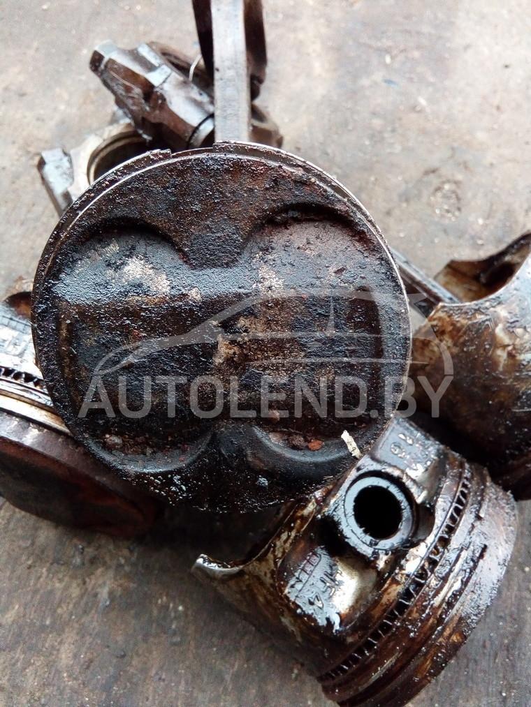 поршень Honda Concerto 1 поколение 1993, 1.3 л., бензин, МКПП, хетчбэк 5 дв. - фото №1