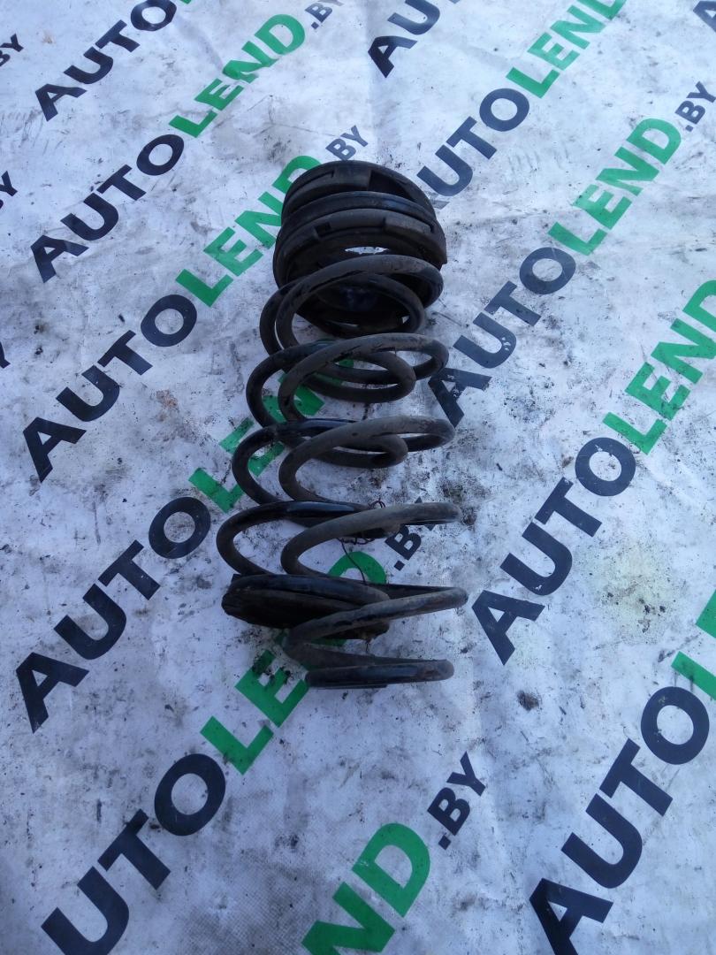 пружина задняя Kia Rio 3 поколение 2012, 1.4 л., бензин, МКПП, хетчбэк 5 дв. - фото №1