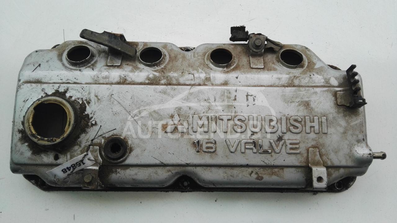 клапанная крышка Mitsubishi Carisma 1 поколение 1997, 1.6 л., бензин, МКПП, хетчбэк 5 дв. - фото №1