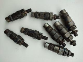 форсунка Nissan Sunny N14 (1991 - 1995), 2.0 л., CD20, дизель, 71B1361