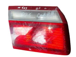 фонарь крышки багажника левый Mazda 626 GF (1997 - 1999), седан