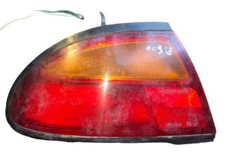 фонарь задний левый Mazda 323F BA 1995