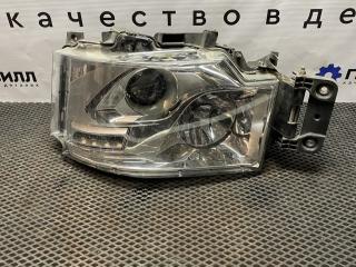 фара левая Renault T-Series 1 поколение (2013 - 2025), 89207611, 7482251331