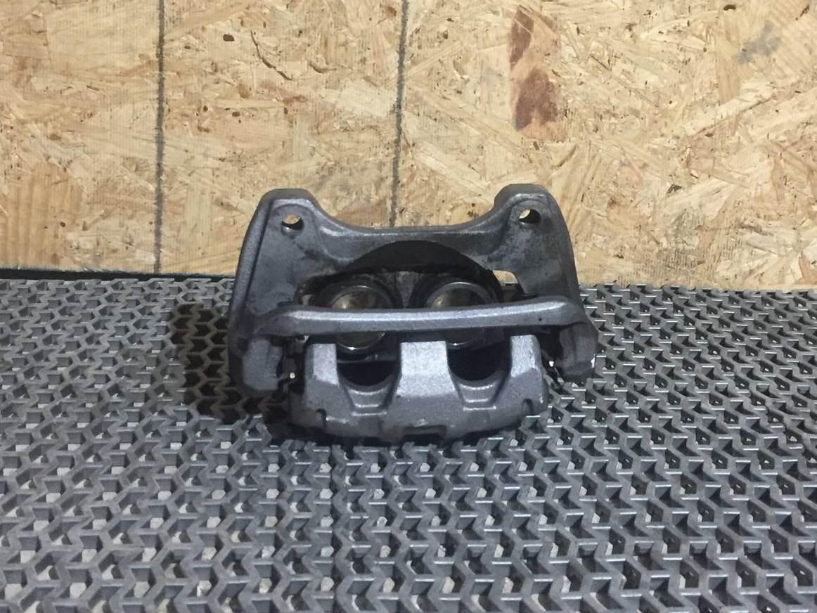 суппорт передний левый Acura TLX 3-е поколение 2021, 2.0 л., бензин, АКПП, седан - фото №1