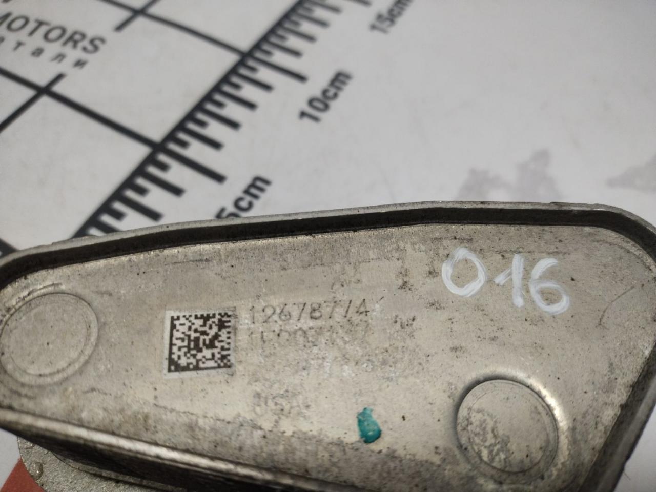 теплообменник масляного фильтра Chevrolet Equinox 3 поколение 2018, 1.5 л., бензин, АКПП, черный, внедорожник 5 дв., полный привод, 12678774 - фото №1