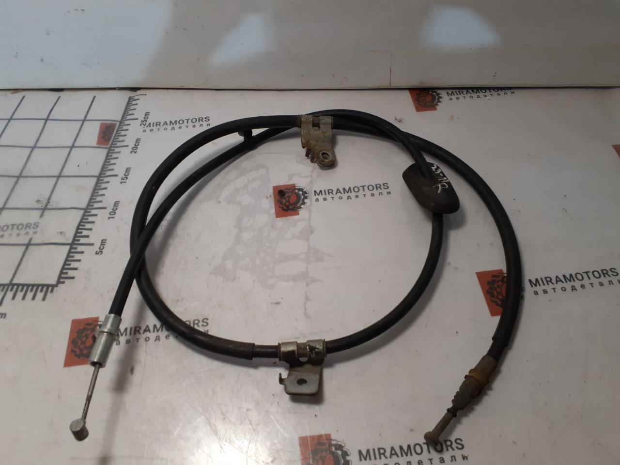 трос ручника Buick Encore 1 поколение 2014, 1.4 л., бензин, АКПП, хетчбэк 5 дв. - фото №1