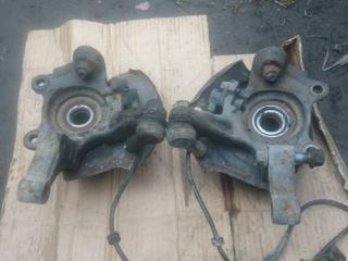 кулак поворотный левый Nissan Almera N16 2002