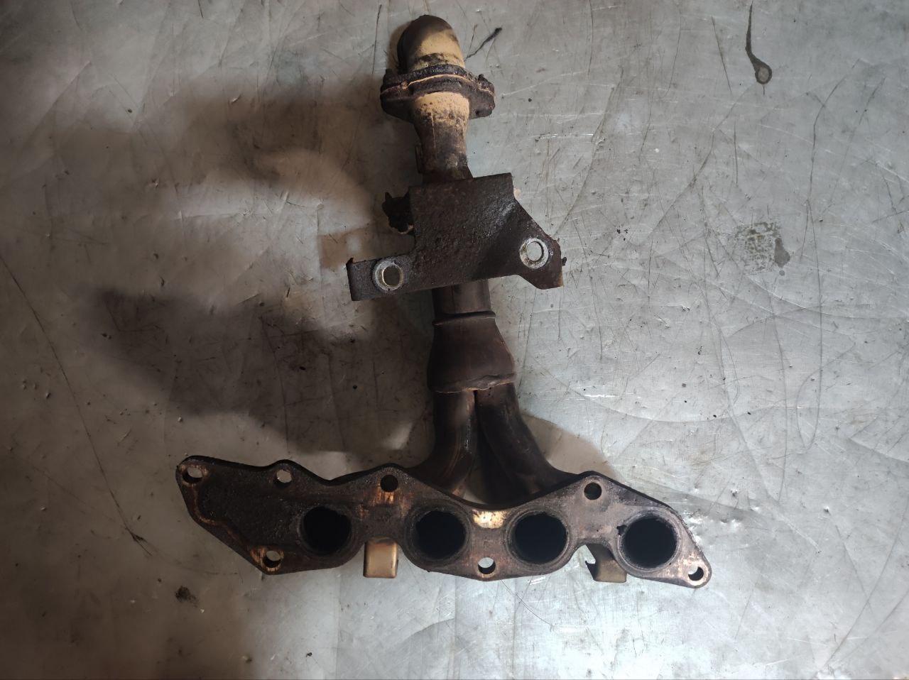 коллектор выпускной Ford Mondeo 3 поколение 2003, 1.8 л., бензин - фото №1
