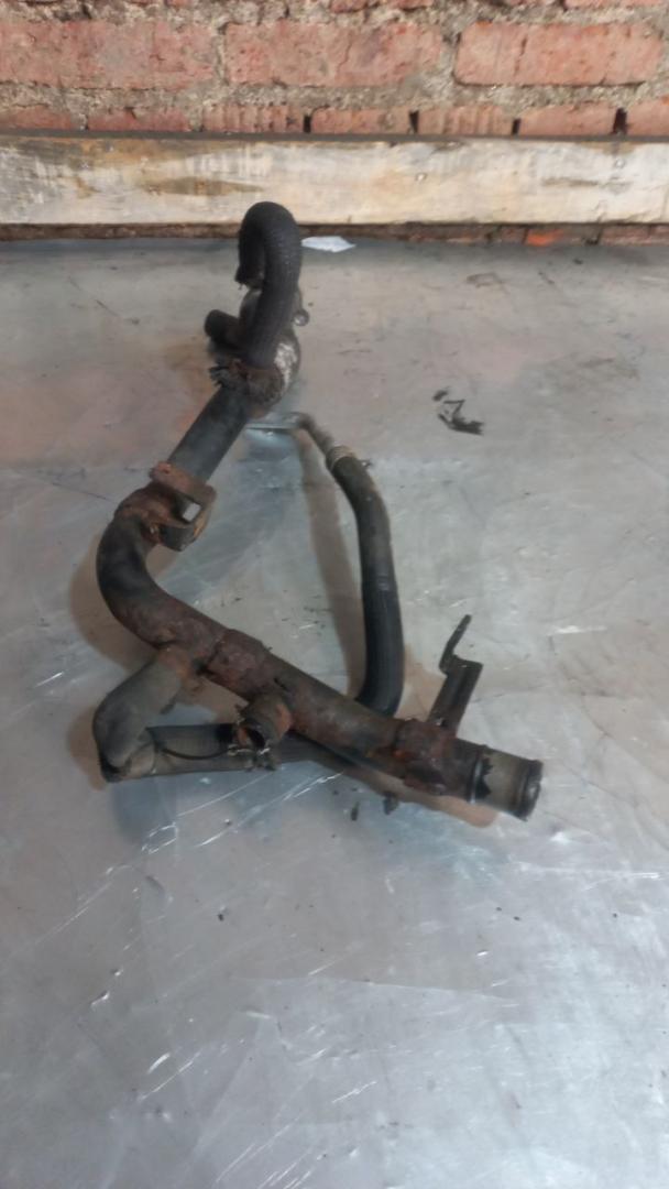 патрубок радиатора Chrysler Voyager 4 поколение 2003, 2.5 л., дизель - фото №1