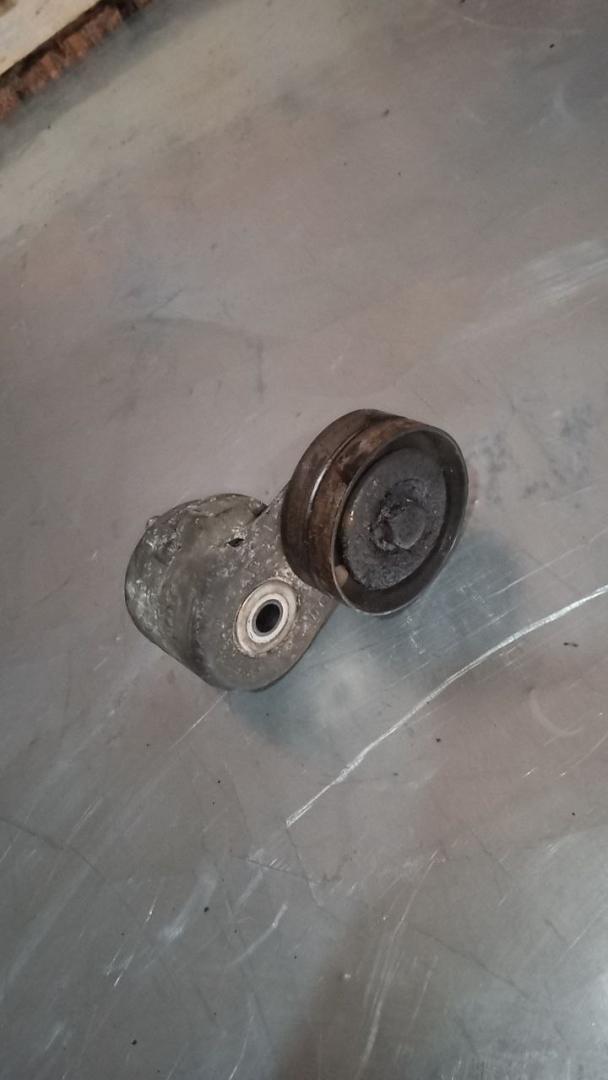 ролик натяжителя Chrysler Voyager 4 поколение 2003, 2.5 л., дизель - фото №1