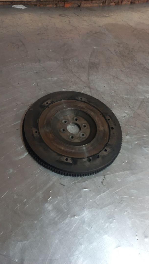 маховик Opel Astra G 2003, 1.4 л., бензин, МКПП, R90232334 - фото №1