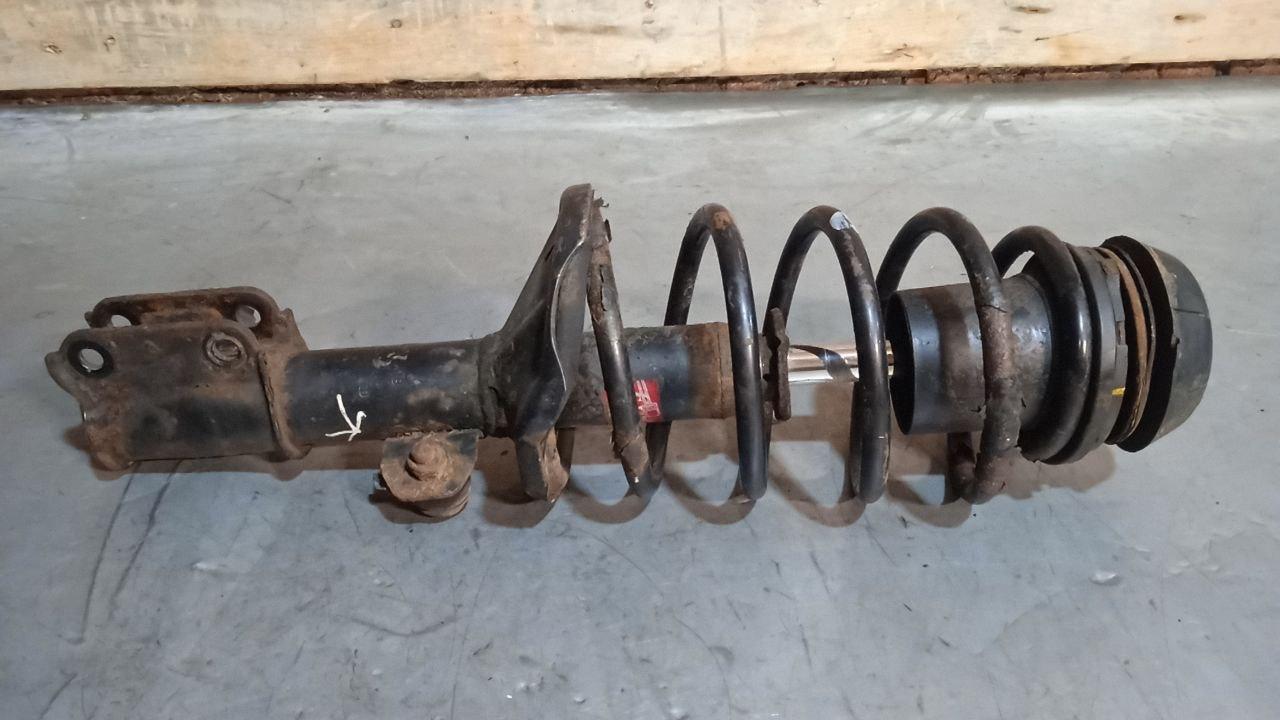 стойка передняя левая Chevrolet Lacetti 1 поколение (2004 - 2013), 1.6 л., бензин, МКПП, хетчбэк 5 дв. - фото №1