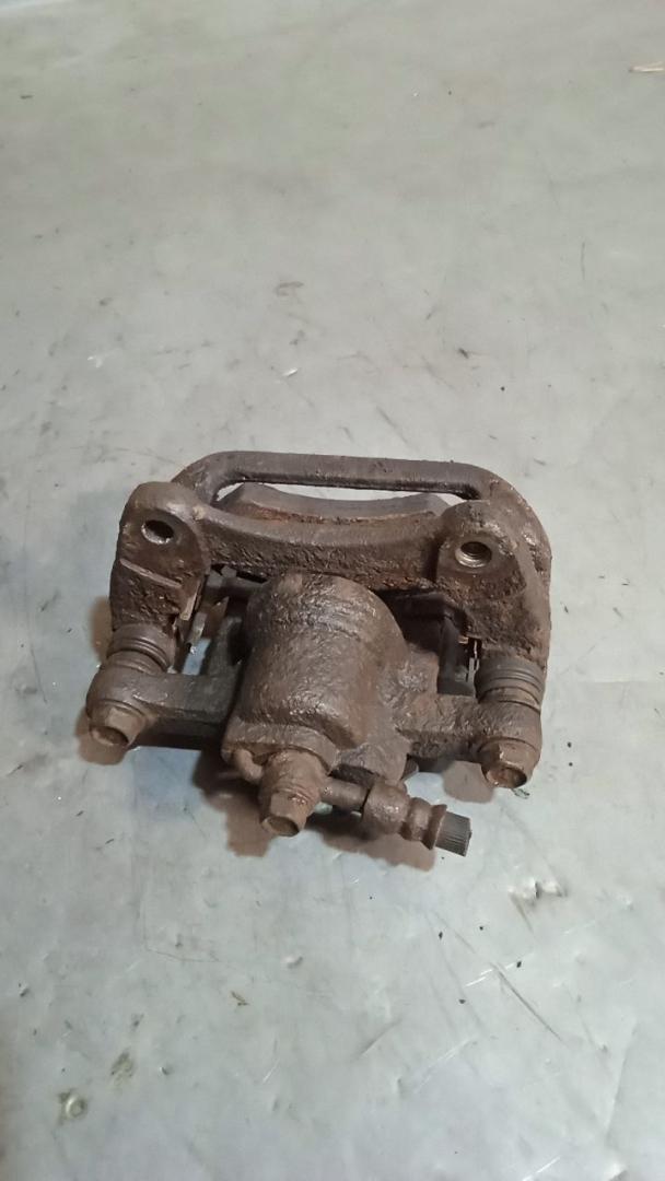 суппорт задний левый Chevrolet Lacetti 1 поколение (2004 - 2013), хетчбэк 5 дв. - фото №1