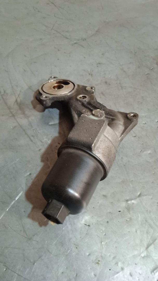 кронштейн масляного фильтра Peugeot 307 1 поколение 2003, 1.6 л., бензин, 9636015310 - фото №1