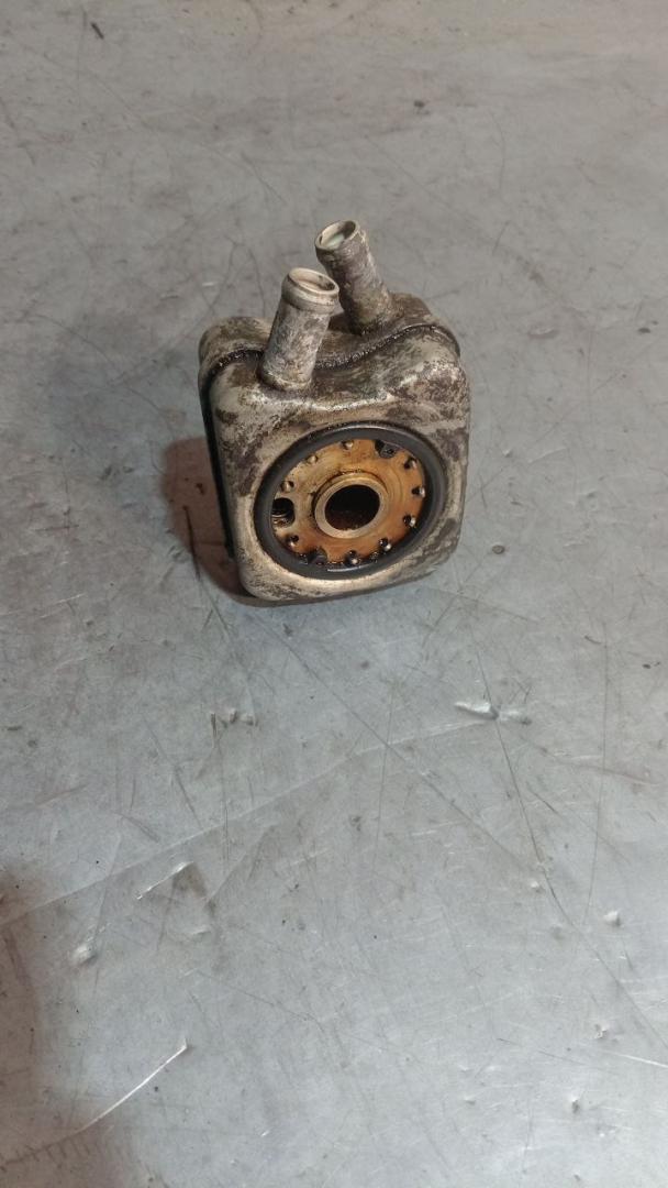 радиатор масляный Skoda Octavia 1 поколение (A4) 1998, 1.8 л., бензин - фото №1