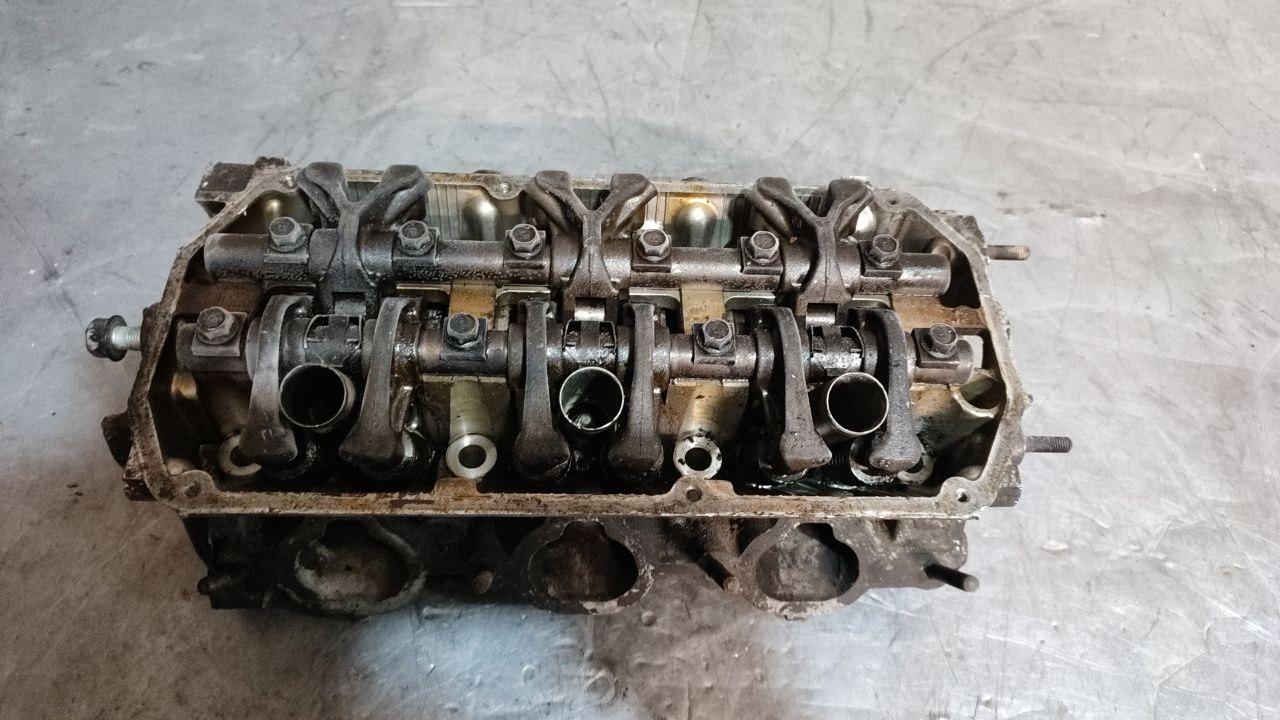 головка блока цилиндров Chrysler Stratus 1 поколение 1999, 2.5 л., бензин - фото №1
