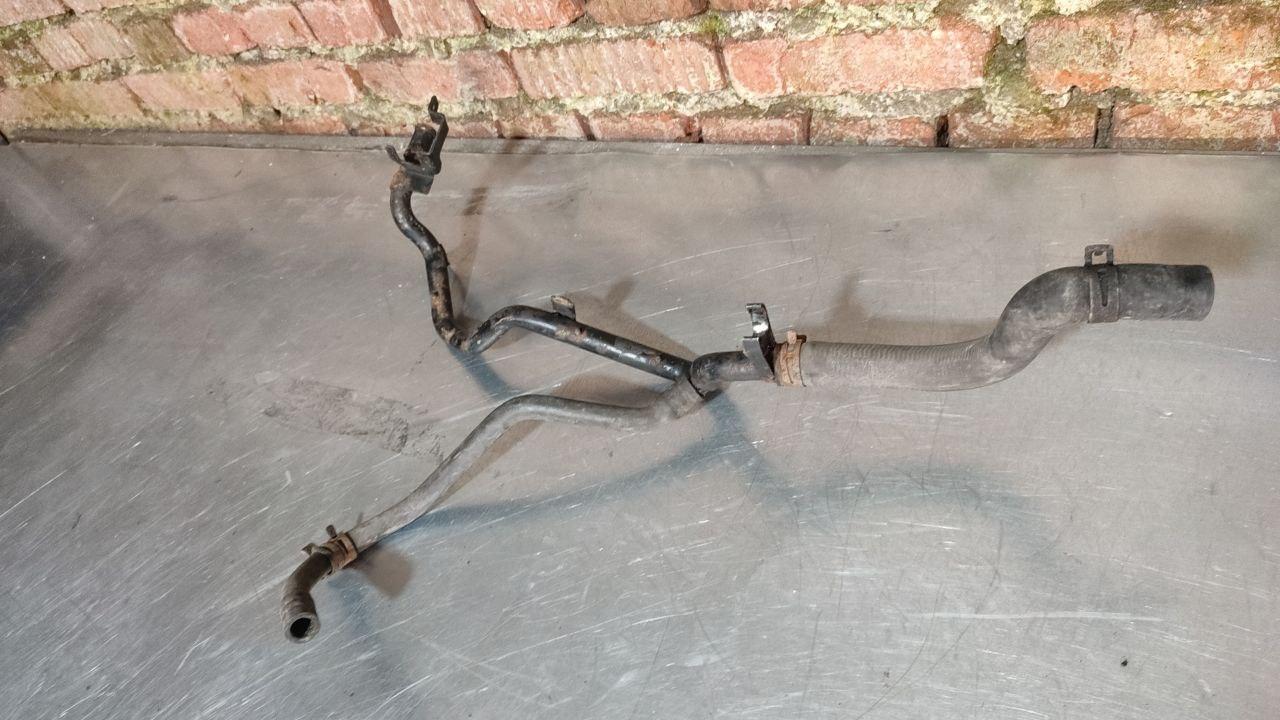 патрубок радиатора Volkswagen Passat B4 (1993 - 1997), 1.9 л., дизель, 357971899F - фото №1