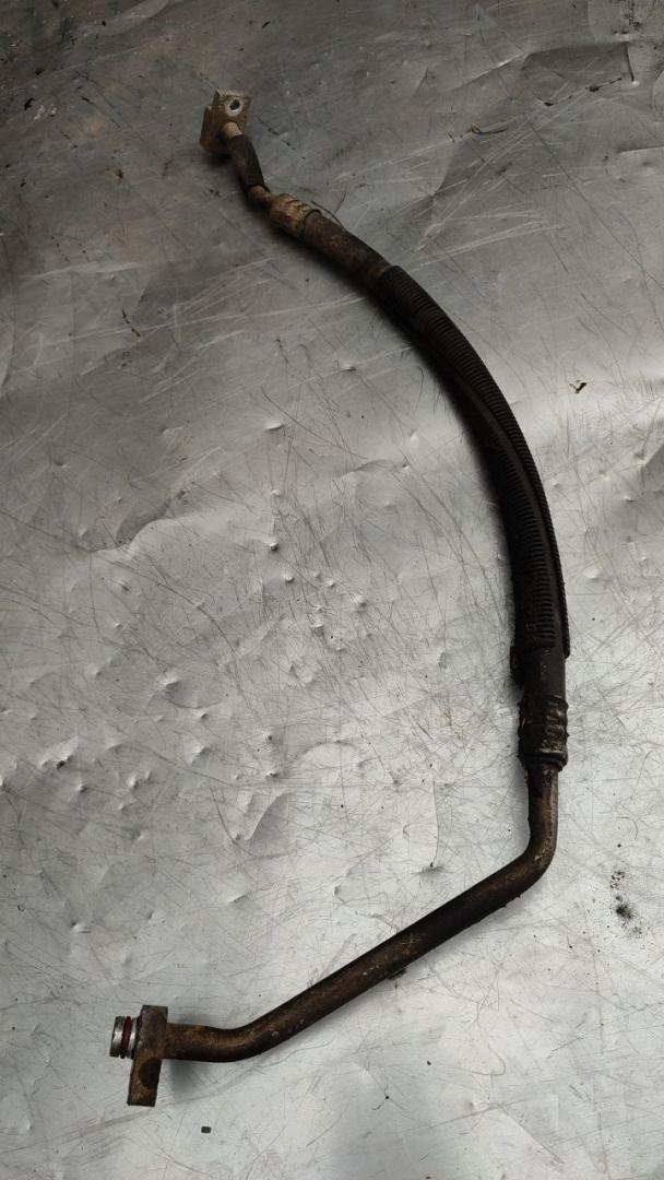 трубка кондиционера Dodge Caravan 4 поколение (2000 - 2007), 2.4 л., бензин, 05005210AA - фото №1