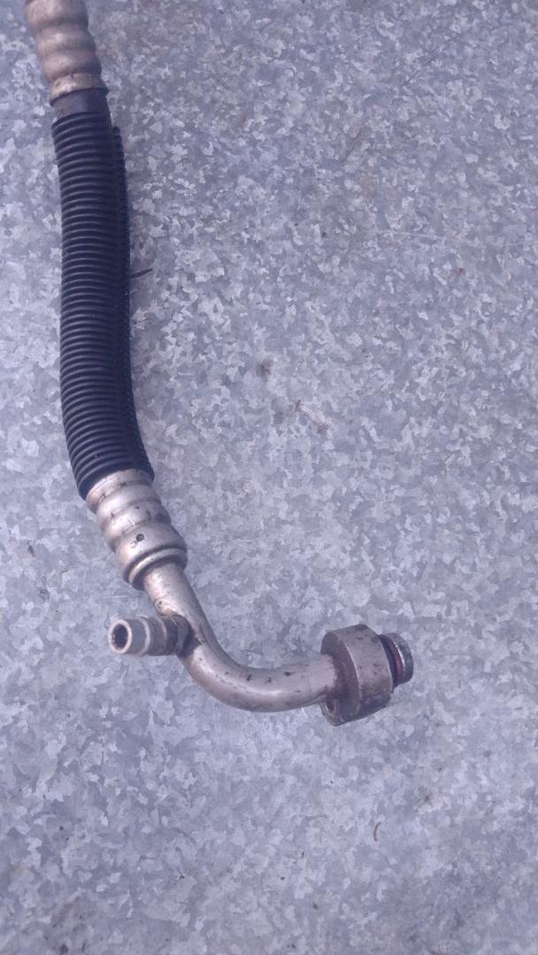 трубка кондиционера Dodge Caravan 4 поколение (2000 - 2007), 2.8 л., дизель, 05005220AC - фото №1