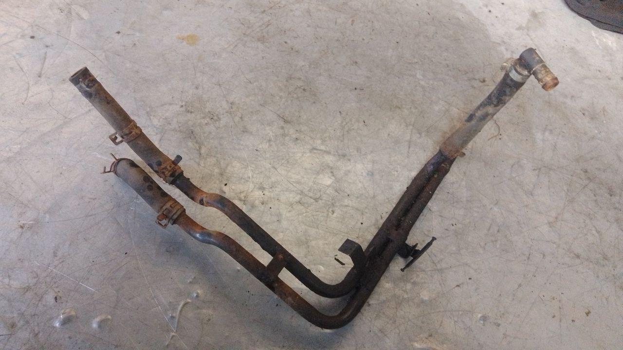 трубка охлаждающей жидкости Dodge Caravan 4 поколение (2000 - 2007), 2.4 л., бензин - фото №1