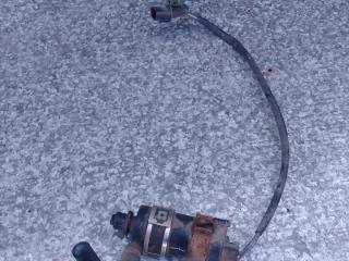 насос (моторчик) омывателя стекла Mitsubishi Lancer 9 поколение (2003 - 2010)