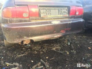 бампер задний Mitsubishi Lancer 6 поколение (1991 - 2000)