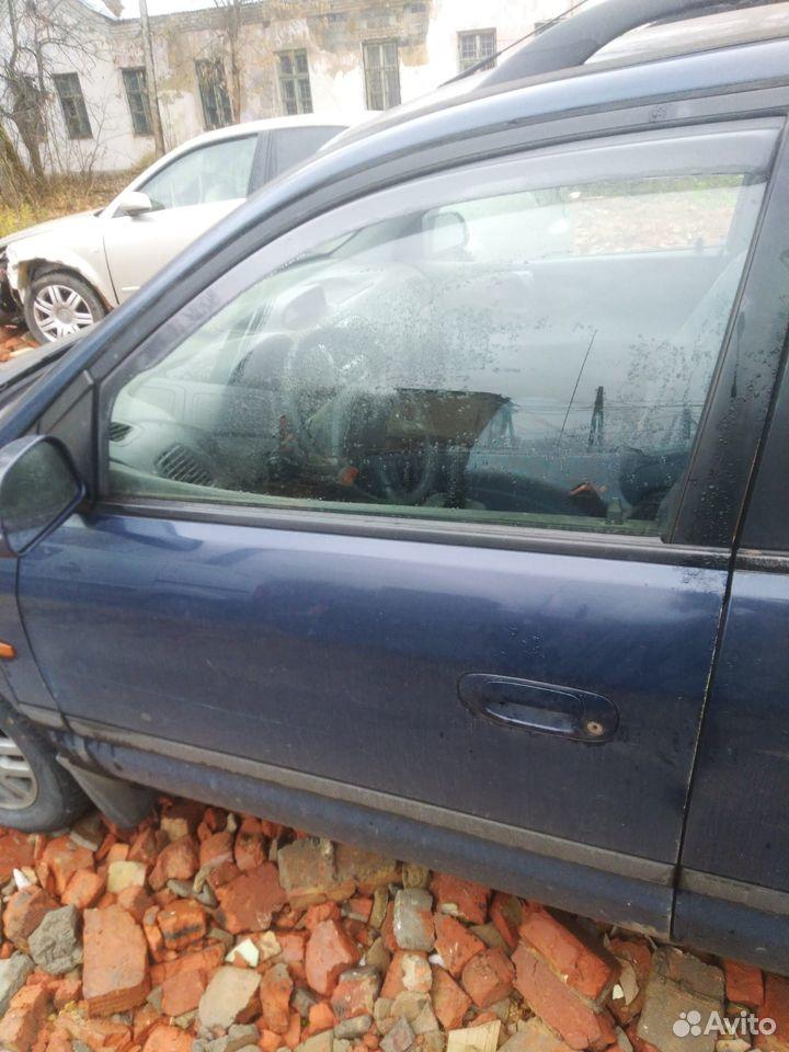 дверь передняя левая Mitsubishi Space Star 1 поколение DG1A 2000, 1.3 л., 4G13 (8V), бензин, МКПП, универсал - фото №1