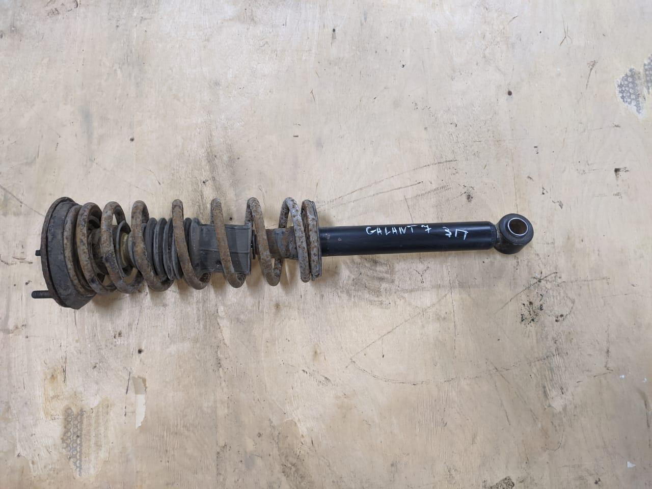 стойка задняя Mitsubishi Galant 7 поколение (1992 - 1997), 1.8 л., 4G93 (SOHC 16V), бензин, МКПП, седан, PSA341142, PSA341142 - фото №1