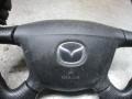 руль Mazda 323 6 поколение [рестайлинг] 2003, 1.6 л., МКПП, хетчбэк 5 дв. - фото №2