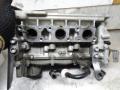 головка блока цилиндров Volkswagen Polo 4 поколение [рестайлинг] 2006, 1.2 л., МКПП, хетчбэк 5 дв., 03D103374T - фото №7