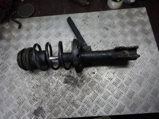 стойка передняя левая Mazda 323P BJ 1999, 1.6 л., МКПП, хетчбэк 5 дв.