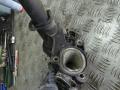 корпус термостата Volkswagen Golf 3 поколение 2000, 1.4 л., 032121111NQ - фото №6