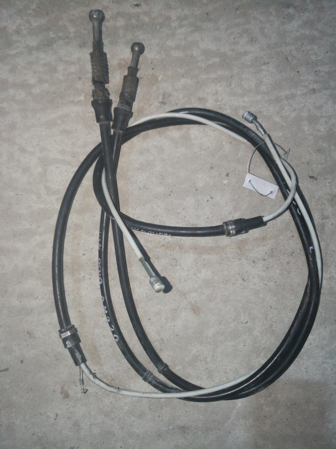 трос ручника Volkswagen Polo 5 поколение 2010, 1.2 л., CBZB, бензин, АКПП, красный, хетчбэк 5 дв., правый руль - фото №1