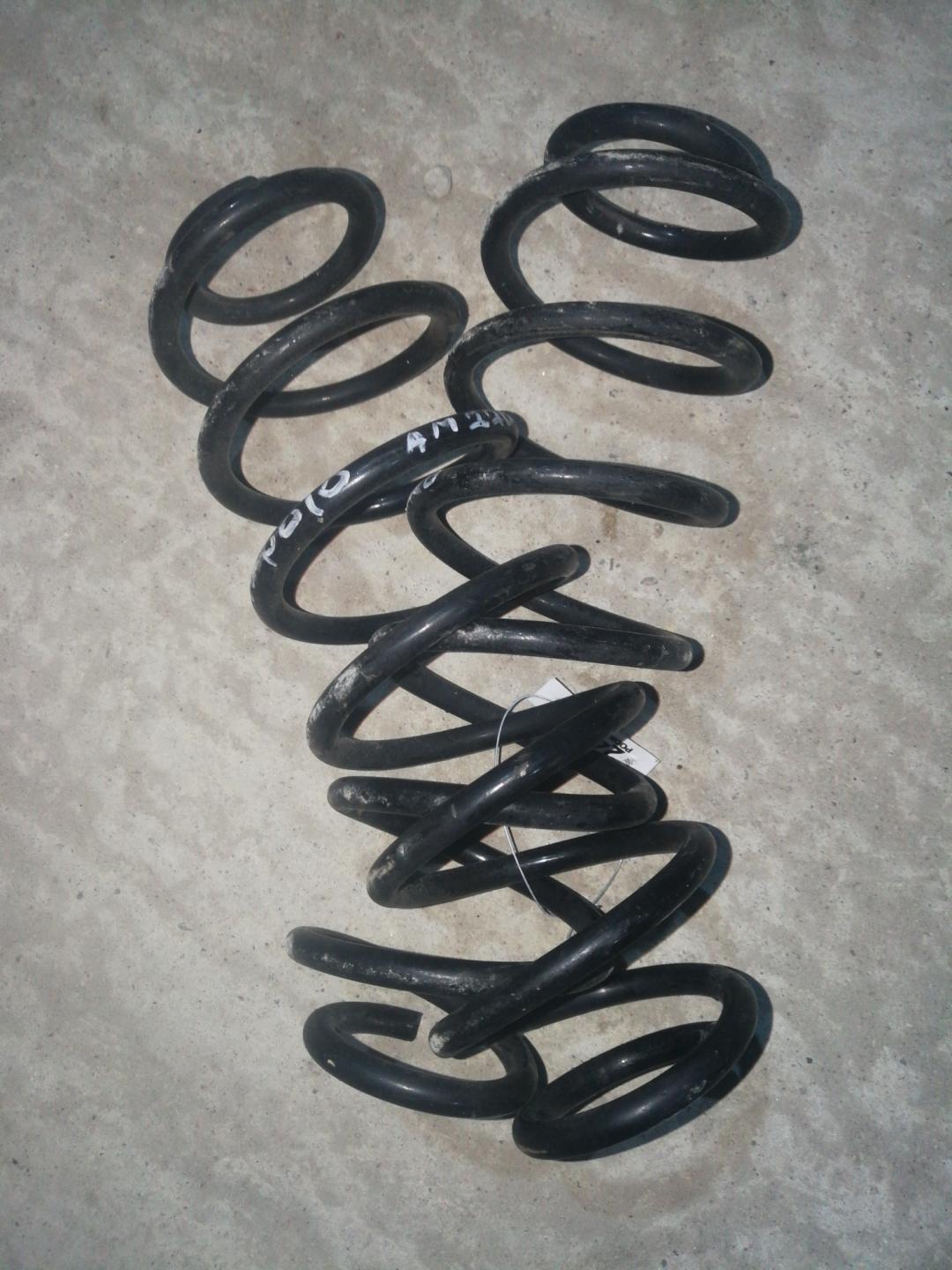 пружина задняя Volkswagen Polo 5 поколение 2010, 1.2 л., CBZB, бензин, АКПП, красный, хетчбэк 5 дв., правый руль - фото №1