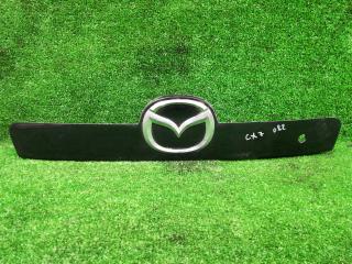 накладка подсветки номера Mazda CX-7 1 поколение 2008, EG2250811
