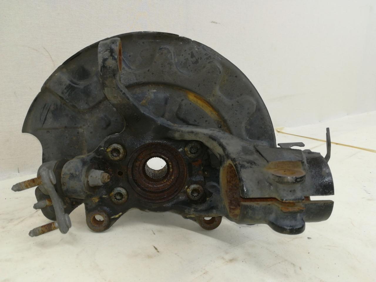 кулак поворотный левый Volkswagen Atlas 1 поколение 2018, 2.4 л., бензин, АКПП, седан - фото №1