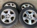 диск литой Subaru Forester 2 поколение (SG) SG 2004, 2.5 л., EJ251, бензин, МКПП, серебристый, полный привод - фото №2