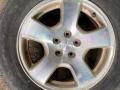 диск литой Subaru Forester 2 поколение (SG) SG 2004, 2.5 л., EJ251, бензин, МКПП, серебристый, полный привод - фото №2