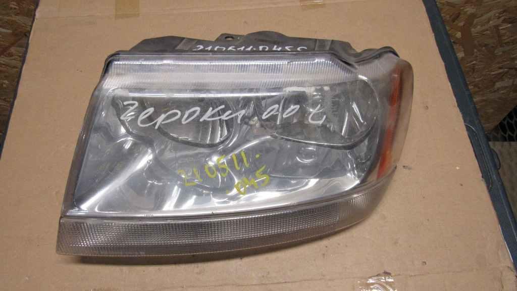 фара левая Jeep Grand Cherokee WJ 2000, 4.7 л., EVA, бензин, АКПП, внедорожник 5 дв. - фото №1