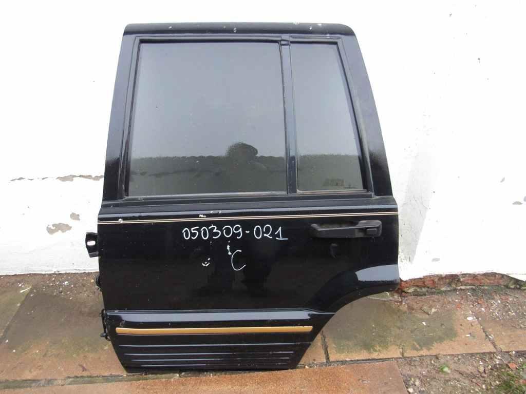 дверь задняя левая Jeep Grand Cherokee ZJ 1995, 4.0 л., бензин, внедорожник 5 дв. - фото №1