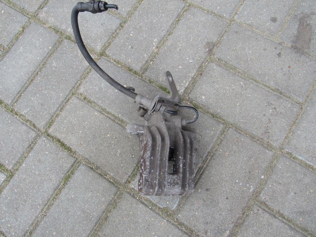 суппорт задний правый Volkswagen Golf 5 поколение 2008 - фото №1