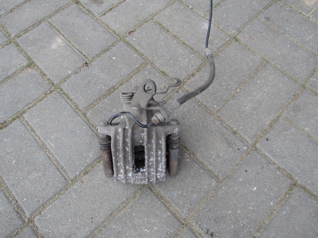 суппорт задний левый Volkswagen Golf 5 поколение 2008 - фото №1