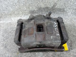 суппорт передний левый Opel Astra G (1998 - 2009)