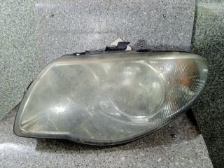 фара левая Chrysler Voyager 4 поколение [рестайлинг] (2004 - 2007), 04857831AC