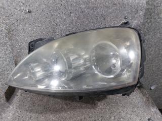 фара левая Opel Corsa C [рестайлинг] (2003 - 2006), 13100535