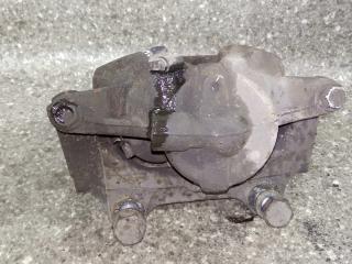 суппорт передний левый Opel Corsa D (2006 - 2010)