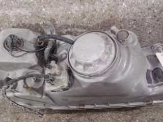 фара левая Kia Carnival UP/GQ 2000